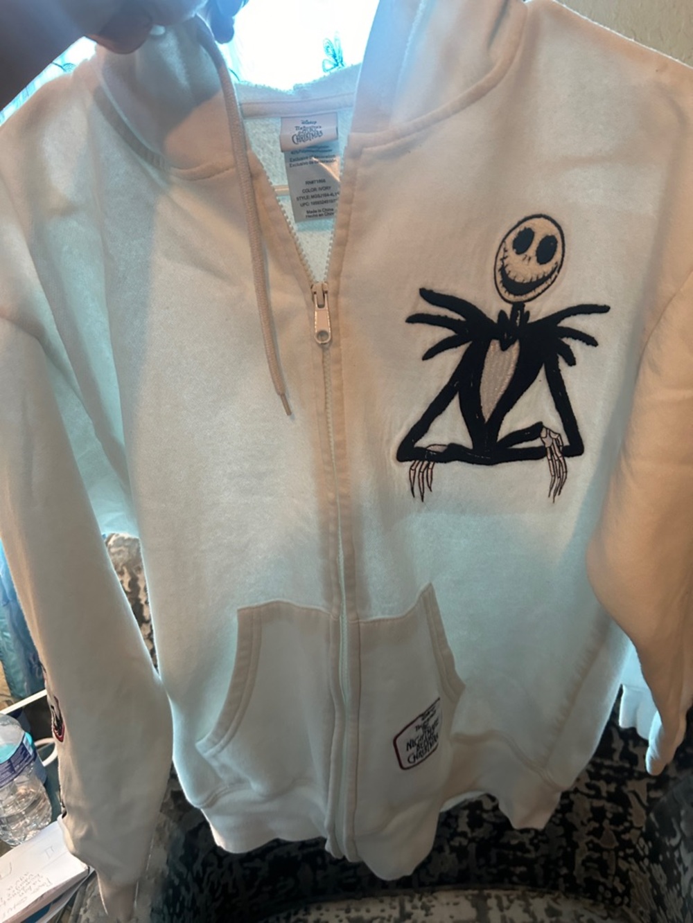 Disney Cream Hooded Zip Jacket with Black Jack Skellington Patch
